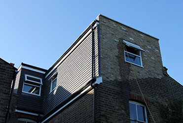 Shaped dormer loft conversion exterior view