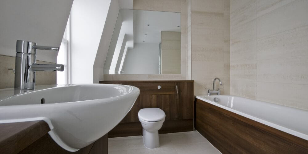 Complex large flat roof dormer in home in Wimbledon