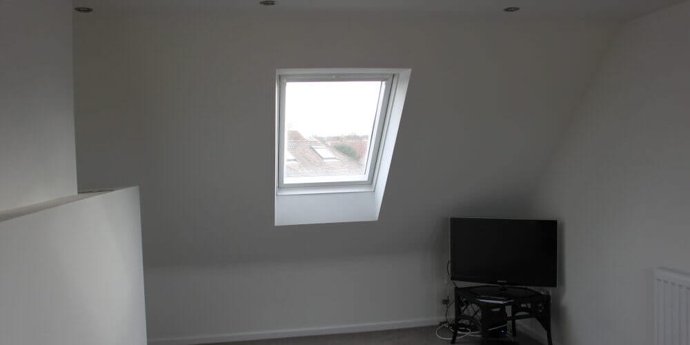 Complex low ridge conversion in house in Watford