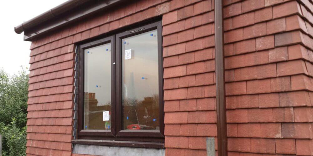 Flat roof dormer trussed roof in Wimbledon