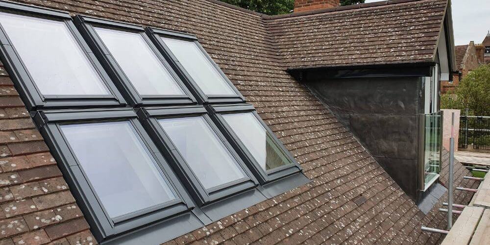 Touchstone lofts velux window leaded pitch roof dormer loft conversion in a house in Croydon