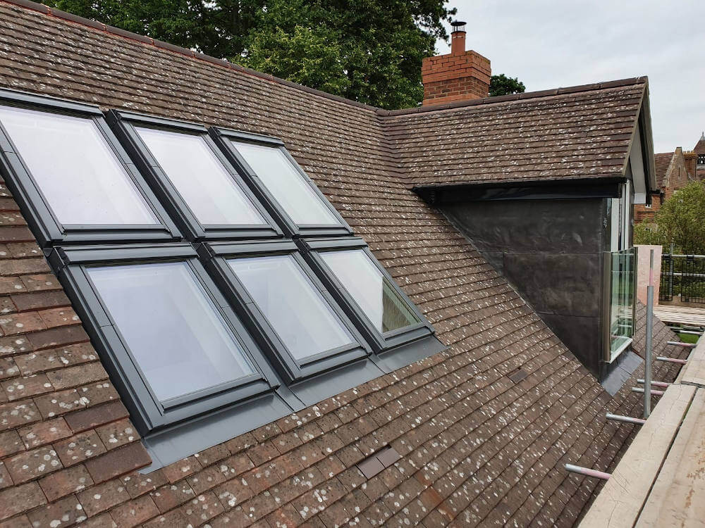 Touchstone lofts velux window leaded pitch roof dormer loft conversion in a house in Croydon